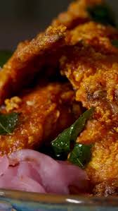The Elephant Room signature dishes Murtabak PizzaKashmiri WingsPopcorn Chicken